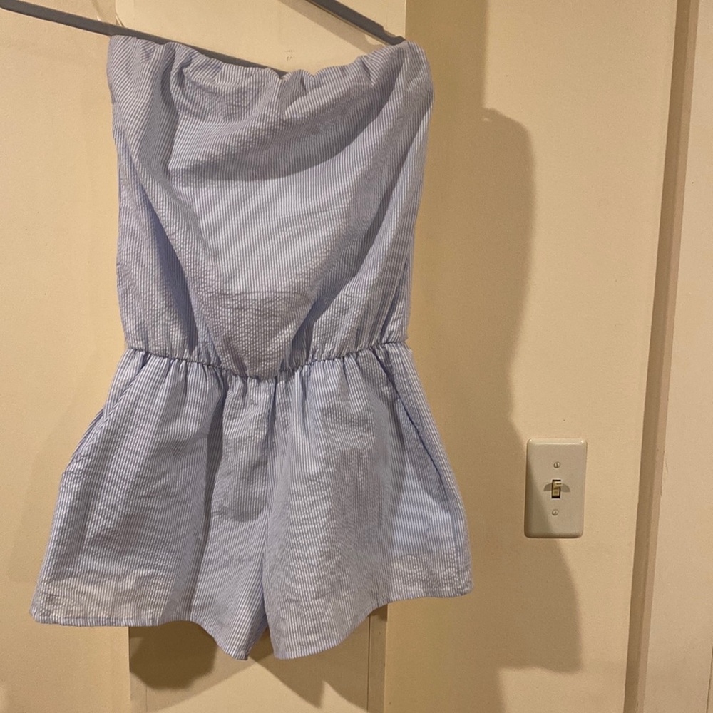 Super cute brand new light blue seer sucker romper with pockets